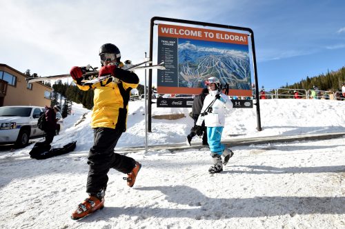 Jonathan Epstein and his daughter Carlie, 12, walk back to their cars after skiing at Eldora Mountain Resort on Sunday in Boulder County. Eldora lies within the South Platte Basin, which has one of the best snowpacks in the state right now. Photo by Jeremy Papasso