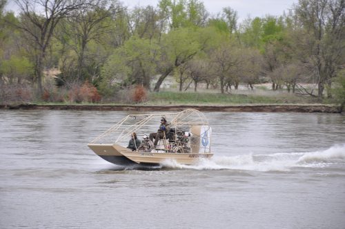 Technicians surveying the central Platte River for interior least tern and piping plover nesting and foraging activities. Credit: Platte River Recovery Implementation Program.