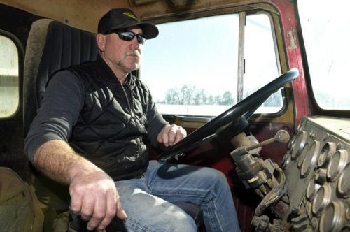 Joe Docheff hauls silage Friday on his family's dairy farm east of Longmont. Docheff rents some water from the city for crops on his land. Docheff also manages some Longmont agricultural open space properties that are watered with Colorado-Big Thompson units. (Lewis Geyer / Longmont Times-Call Staff Photographer)