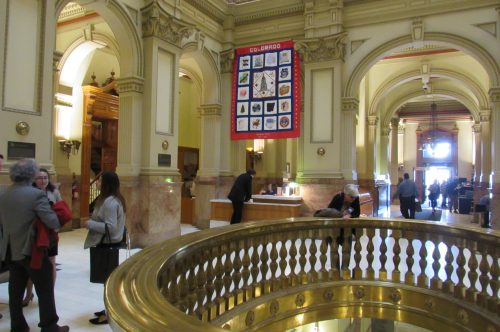 Lawmakers and visitors fill the rotunda at the State Capitol on Tuesday March 12. Credit: Jerd Smith