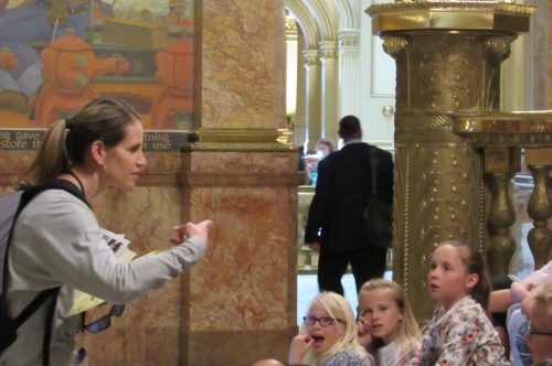 Trout Core Knowledge Teacher Courtney Petros discusses the work of Colorado lawmakers with her fourth grade students on May 3, the last day of the session. The Fort Collins school brings students to the legislature each year on closing day. Credit: Jerd Smith