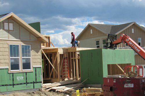 Construction workers build a single family home in Castle Rock. The needs new surface water supplies to reduce its reliance on non-renewable groundwater. Credit: Jerd Smith