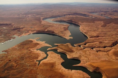 Lake Powell, created with the 1963 completion of Glen Canyon Dam, is the upper basin's largest reservoir on the Colorado River. But 2000-2019 has provided the least amount of inflow into the reservoir, making it the lowest 20-year period since the dam was built, as evidenced by the "bathtub ring" and dry land edging the reservoir, which was underwater in the past. As of October 1, 2019, Powell was 55 percent full. Credit: EcoFlight